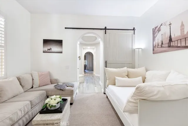 a living room with furniture and a couch