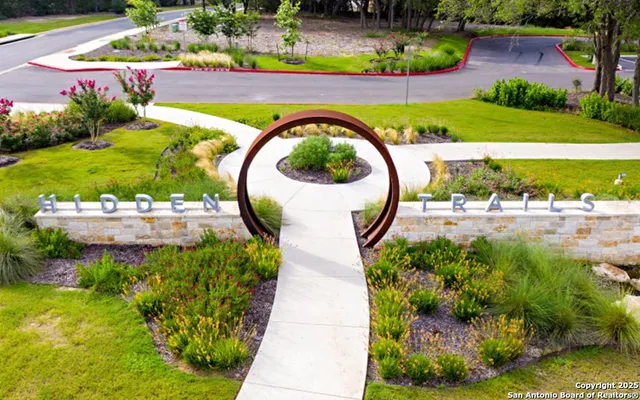 an aerial view of a house with a swimming pool yard and outdoor seating