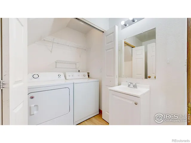 a bathroom with a toilet and a sink