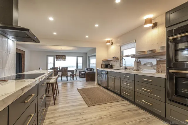 a kitchen with a sink and cabinets