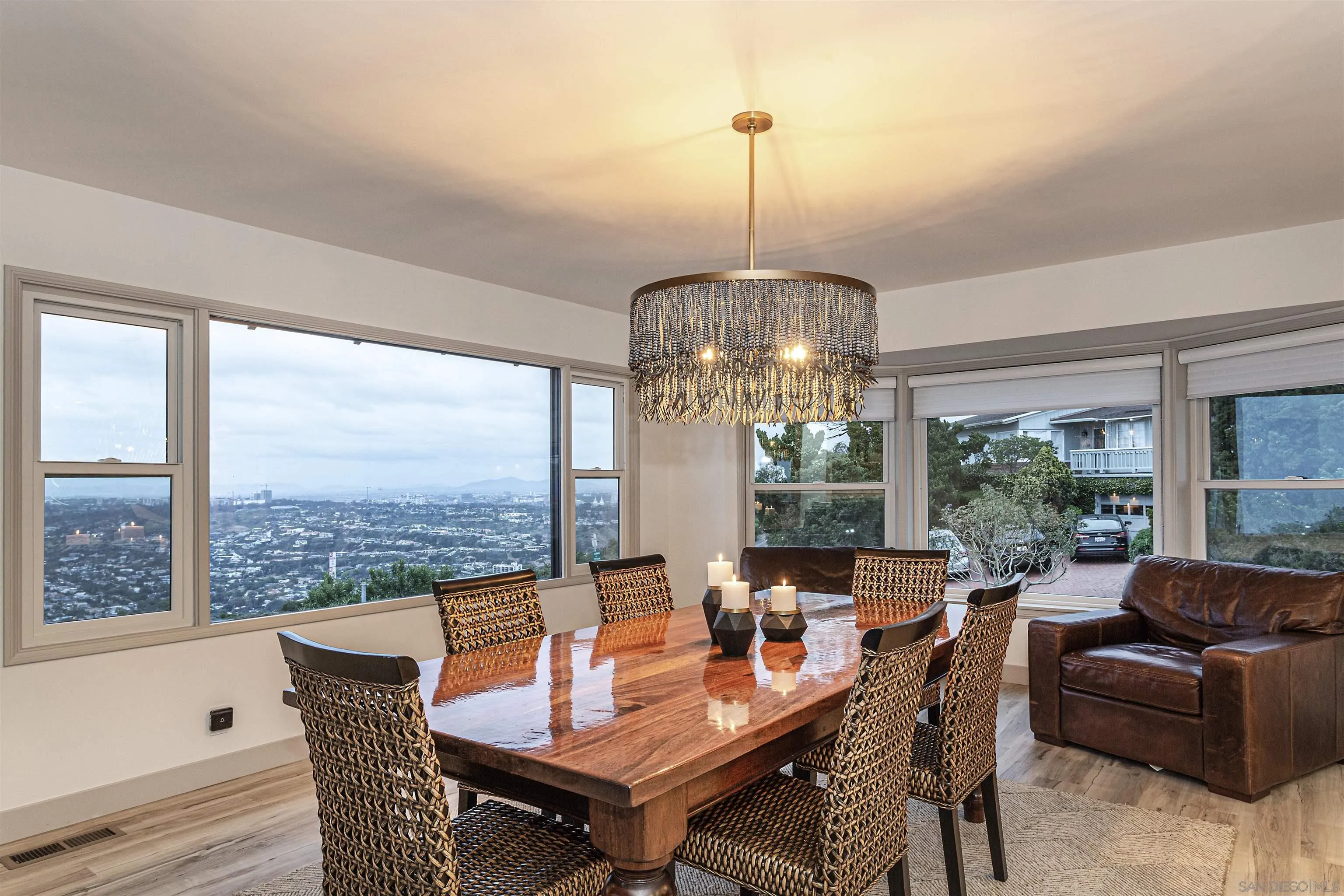 7362 Brodiaea Way La Jolla, CA 92037 - Photo 16 of 31 a view of a dining room with furniture window and outside view