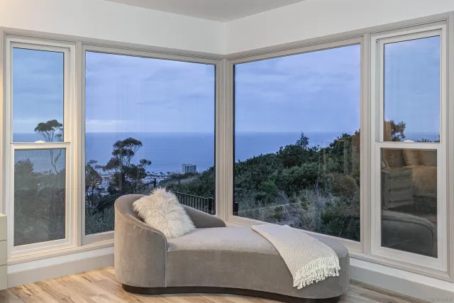 a bathroom with a double vanity sink mirror and shower