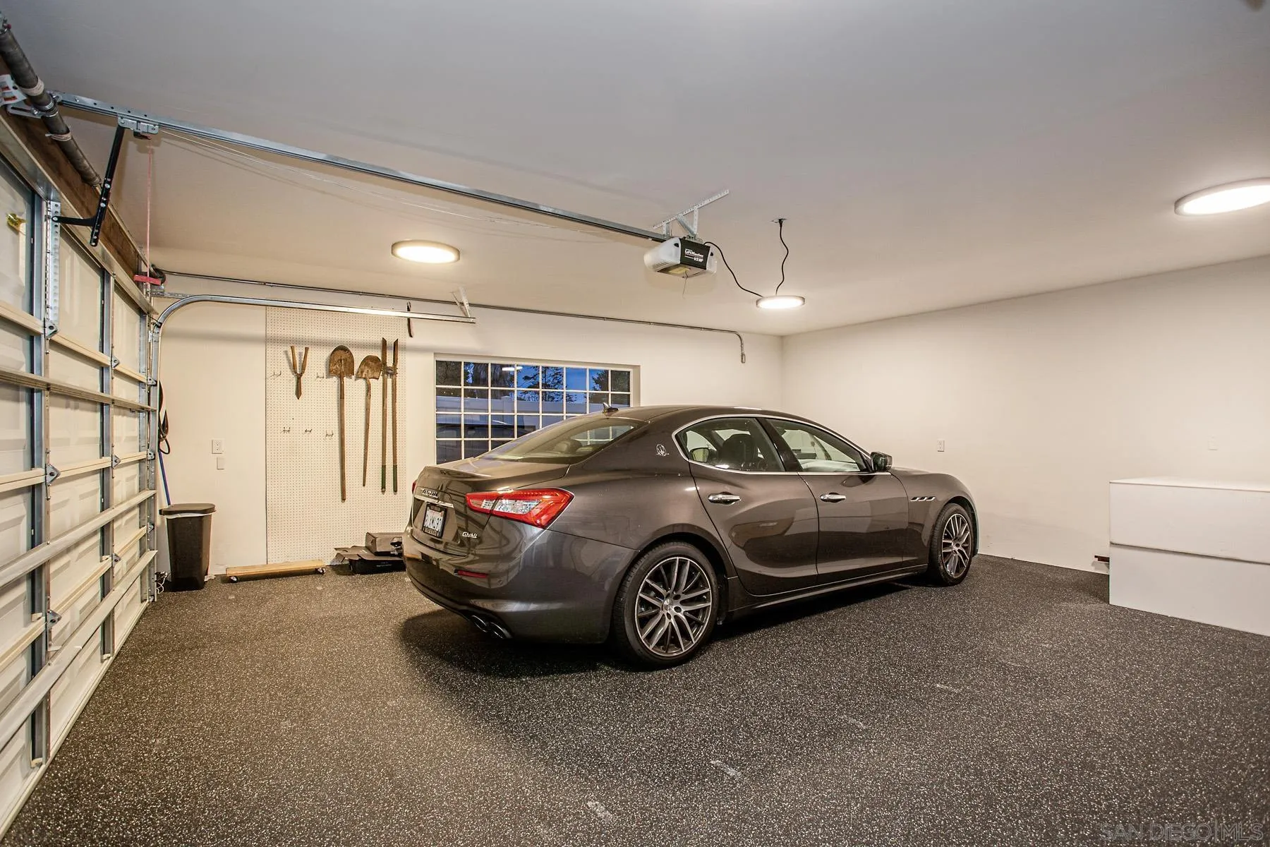 7362 Brodiaea Way La Jolla, CA 92037 - Photo 31 of 31 a car parked in a garage
