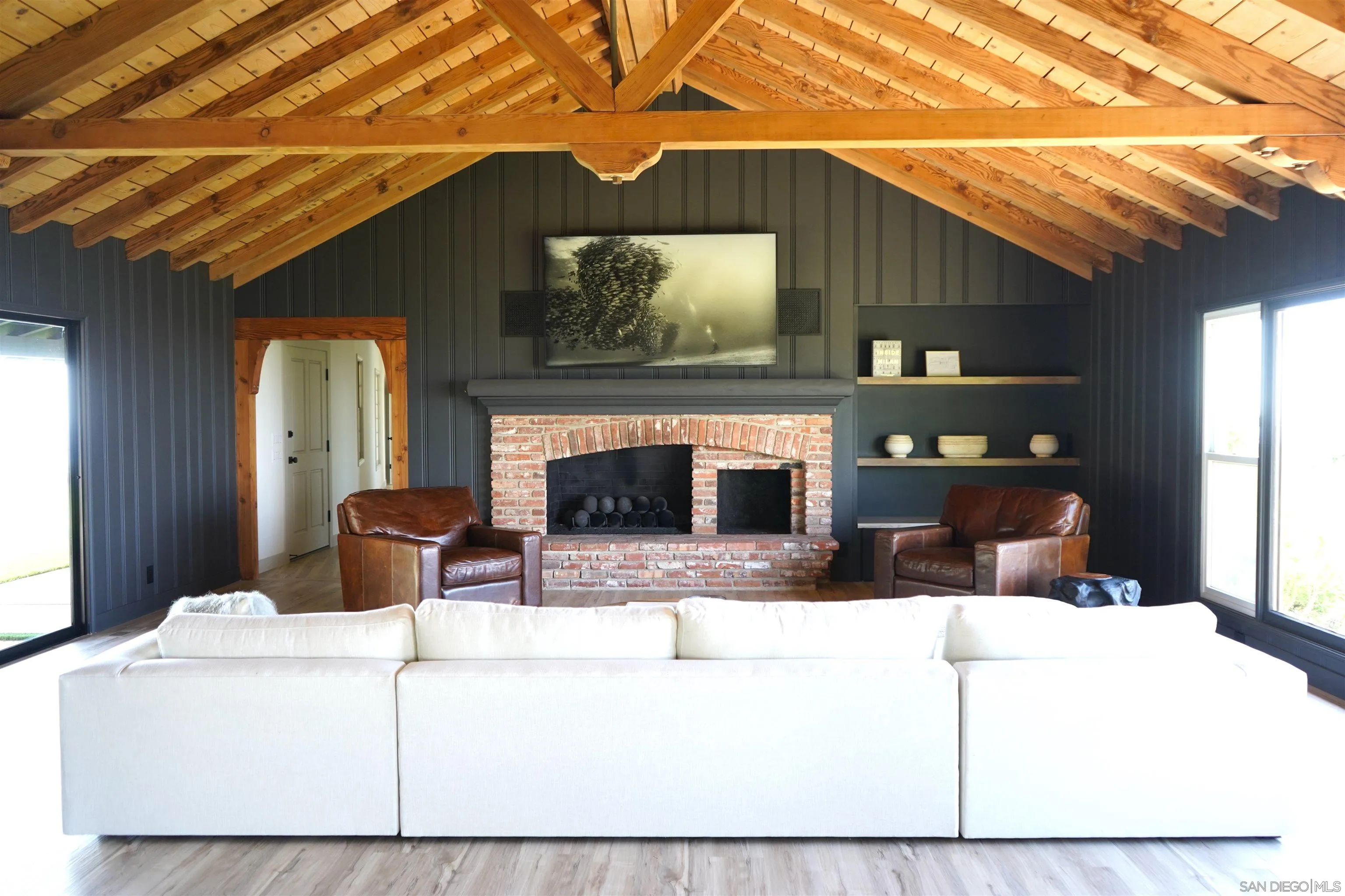 7362 Brodiaea Way La Jolla, CA 92037 - Photo 6 of 31 a living room with furniture and a fireplace