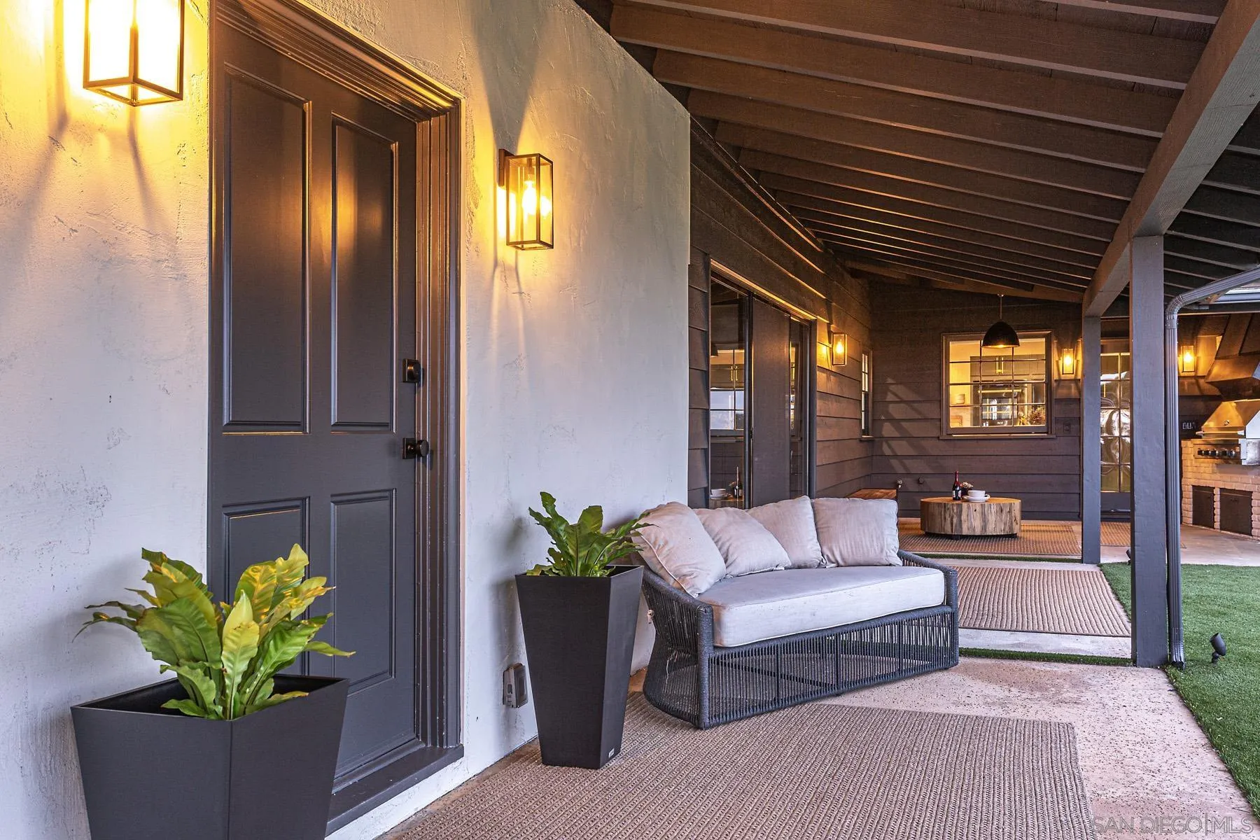 7362 Brodiaea Way La Jolla, CA 92037 - Photo 7 of 31 a lobby with furniture and potted plant