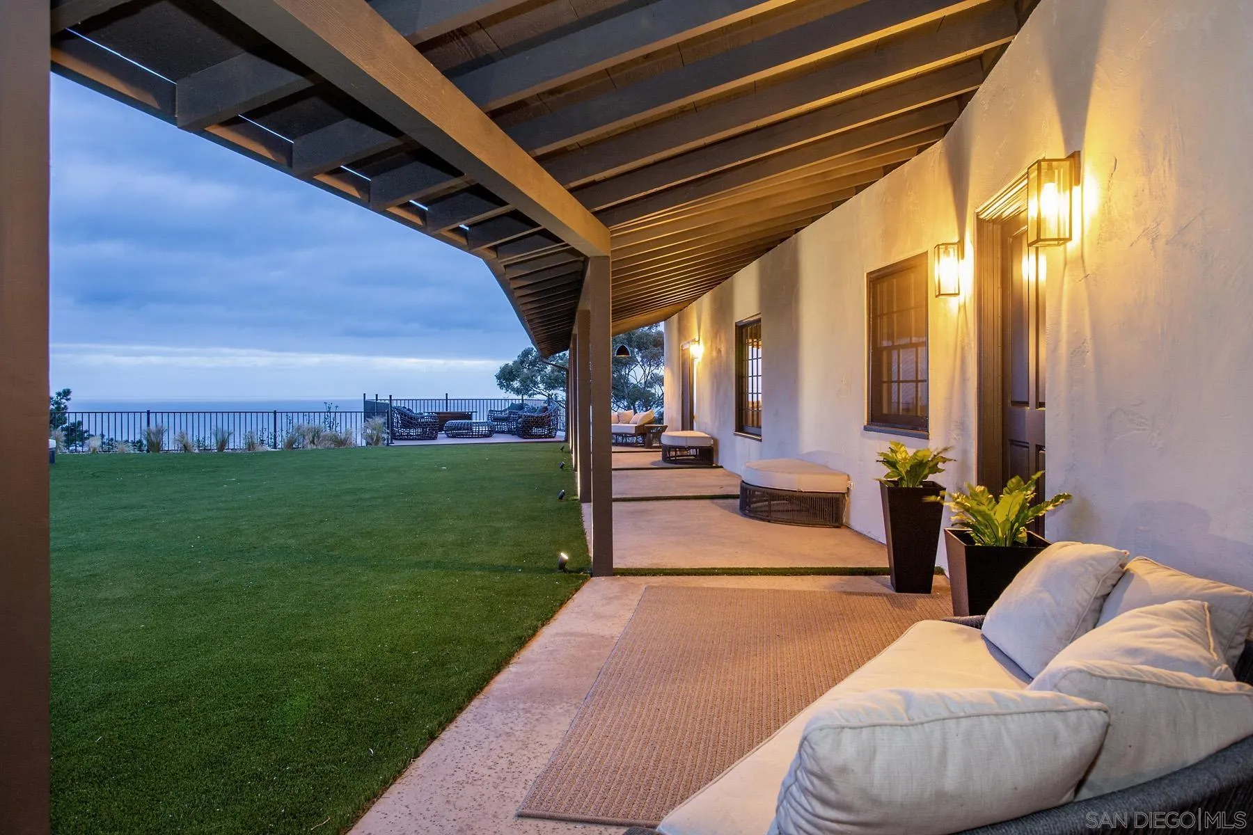 7362 Brodiaea Way La Jolla, CA 92037 - Photo 9 of 31 a outdoor living space with furniture and garden view
