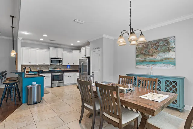 a view of kitchen with granite countertop counter space a sink appliances and cabinets