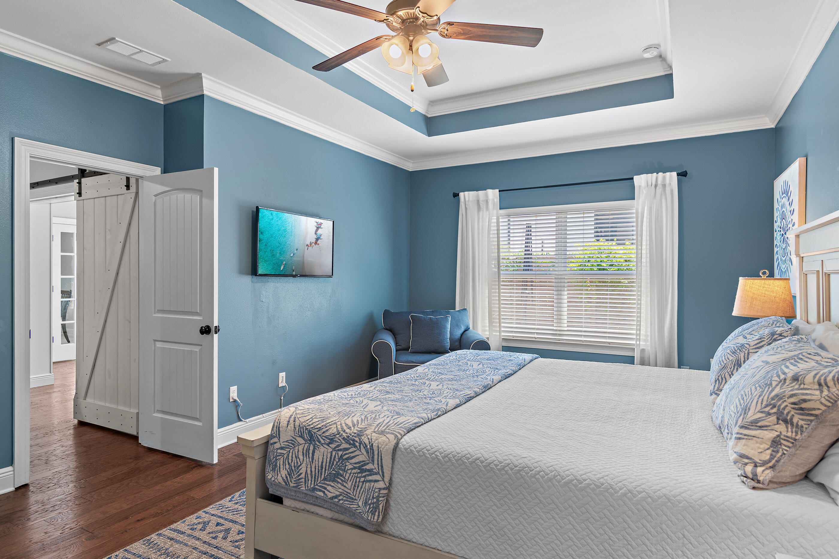 166 Ocean Spray Circle Santa Rosa Beach, FL 32459 - Photo 19 of 31 a bedroom with a bed and a window