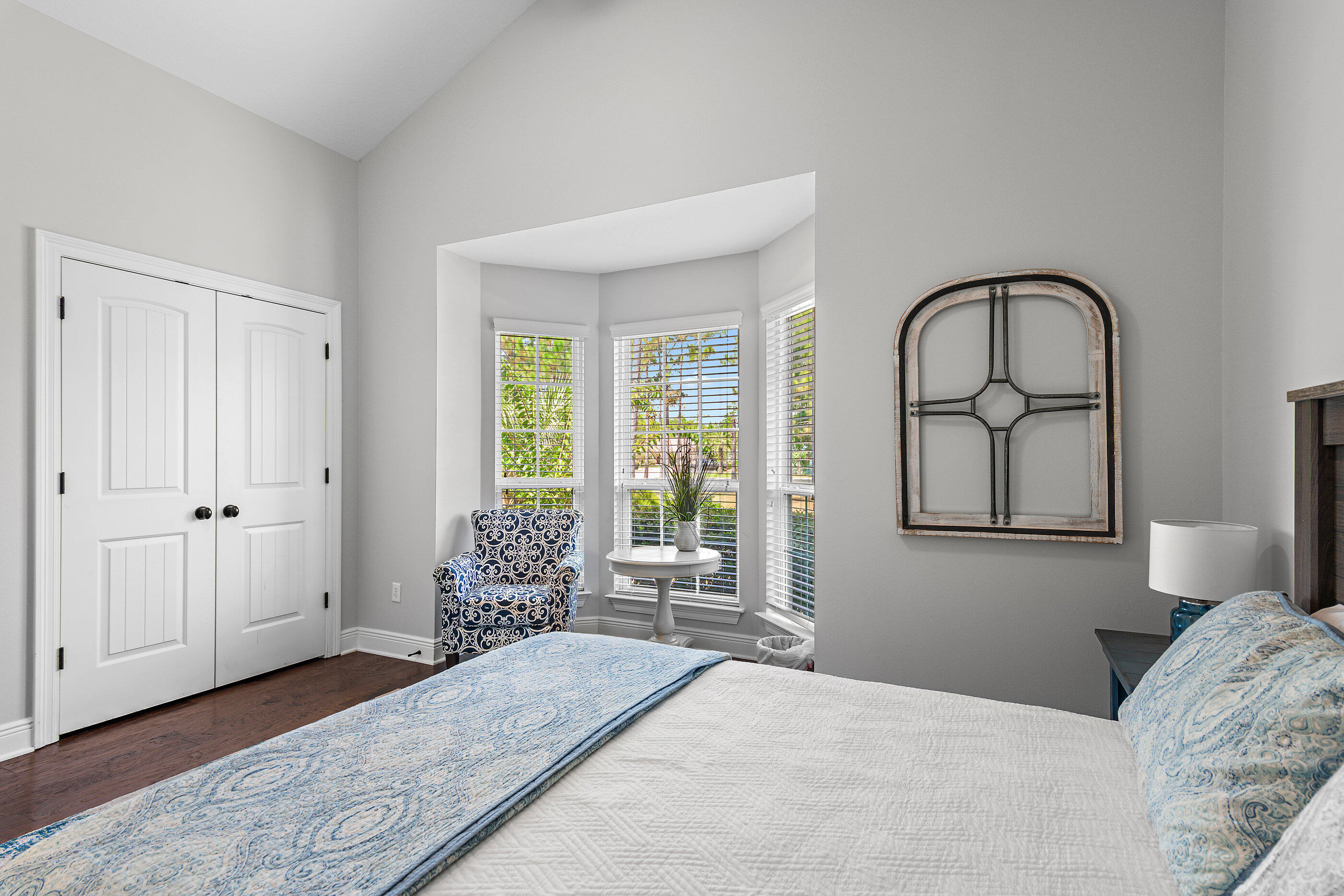 166 Ocean Spray Circle Santa Rosa Beach, FL 32459 - Photo 24 of 31 a bedroom with a bed and a large window