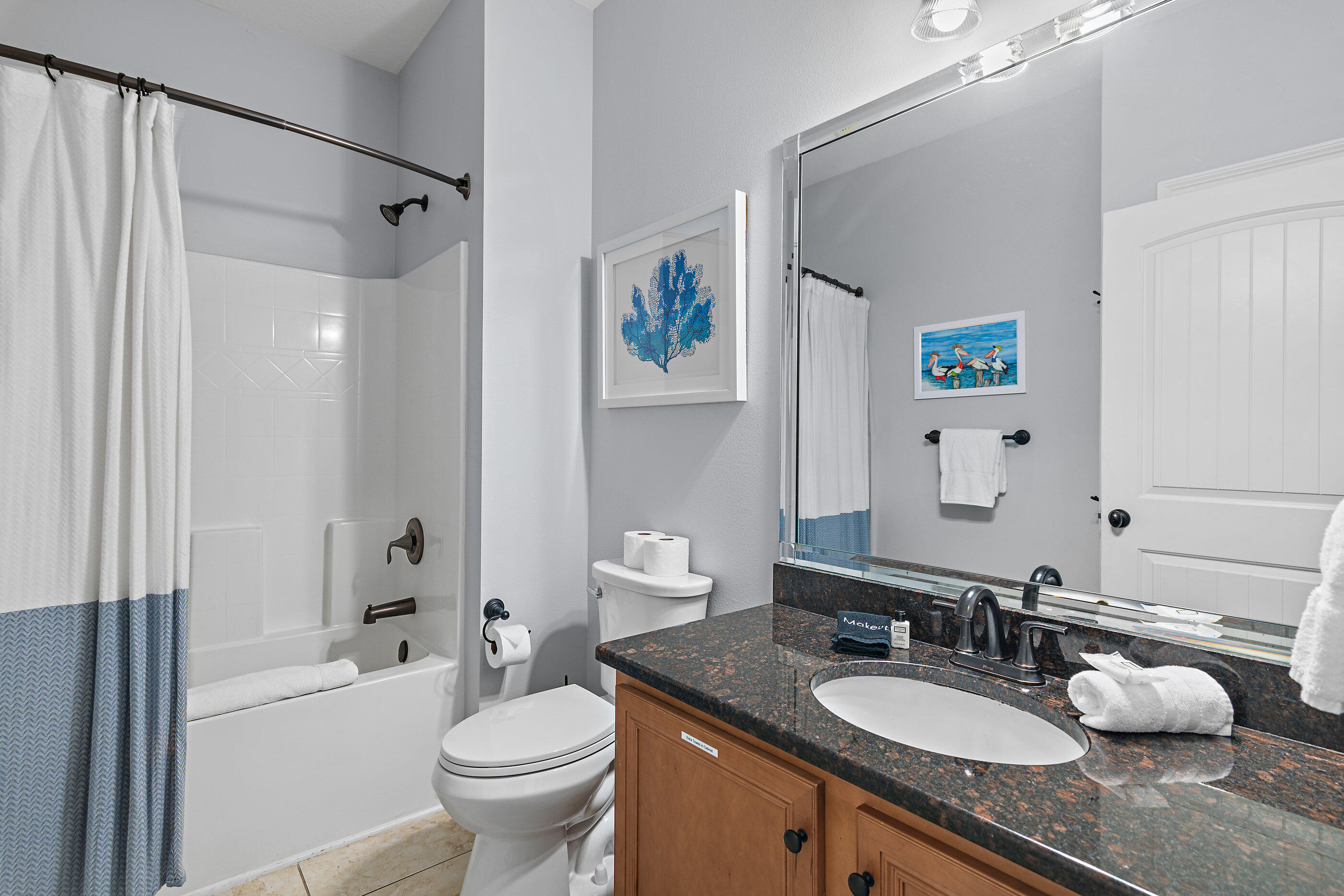 166 Ocean Spray Circle Santa Rosa Beach, FL 32459 - Photo 25 of 31 a bathroom with a granite countertop sink toilet and a mirror