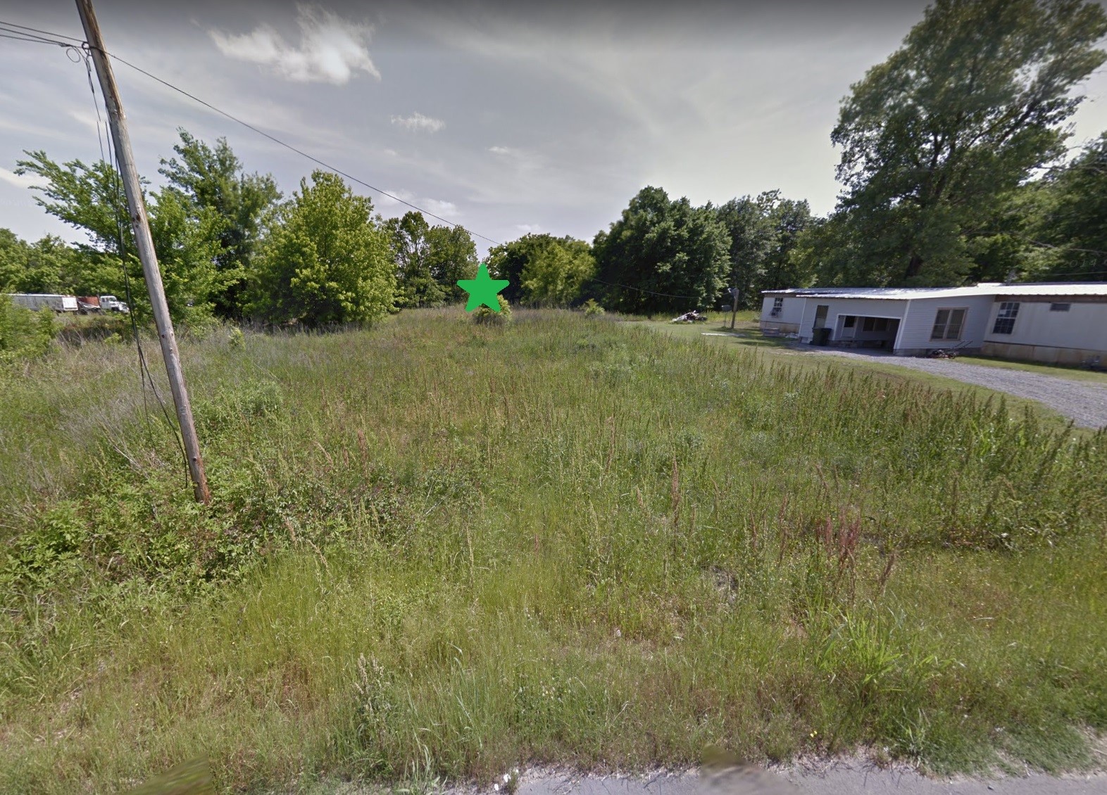 0 Pope Street Other, AR 71643 - Photo 3 of 3 a backyard of a house with lots of green space