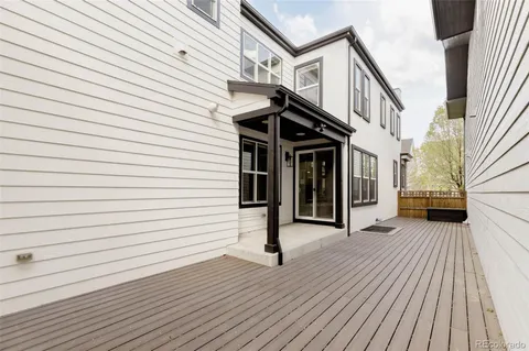a view of balcony and wooden floor