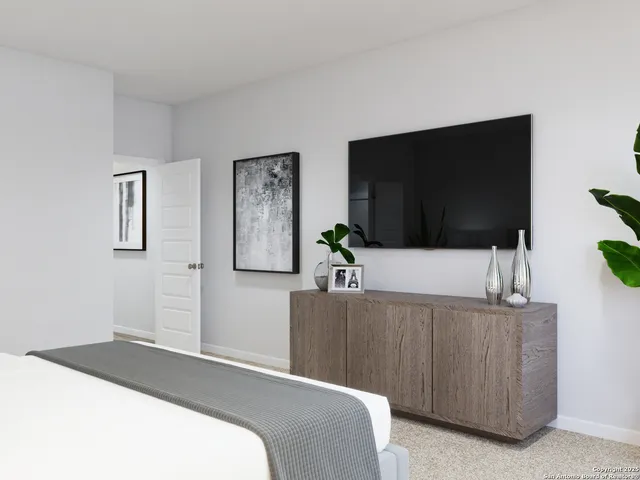 a en suite bathroom with a sink and a shower