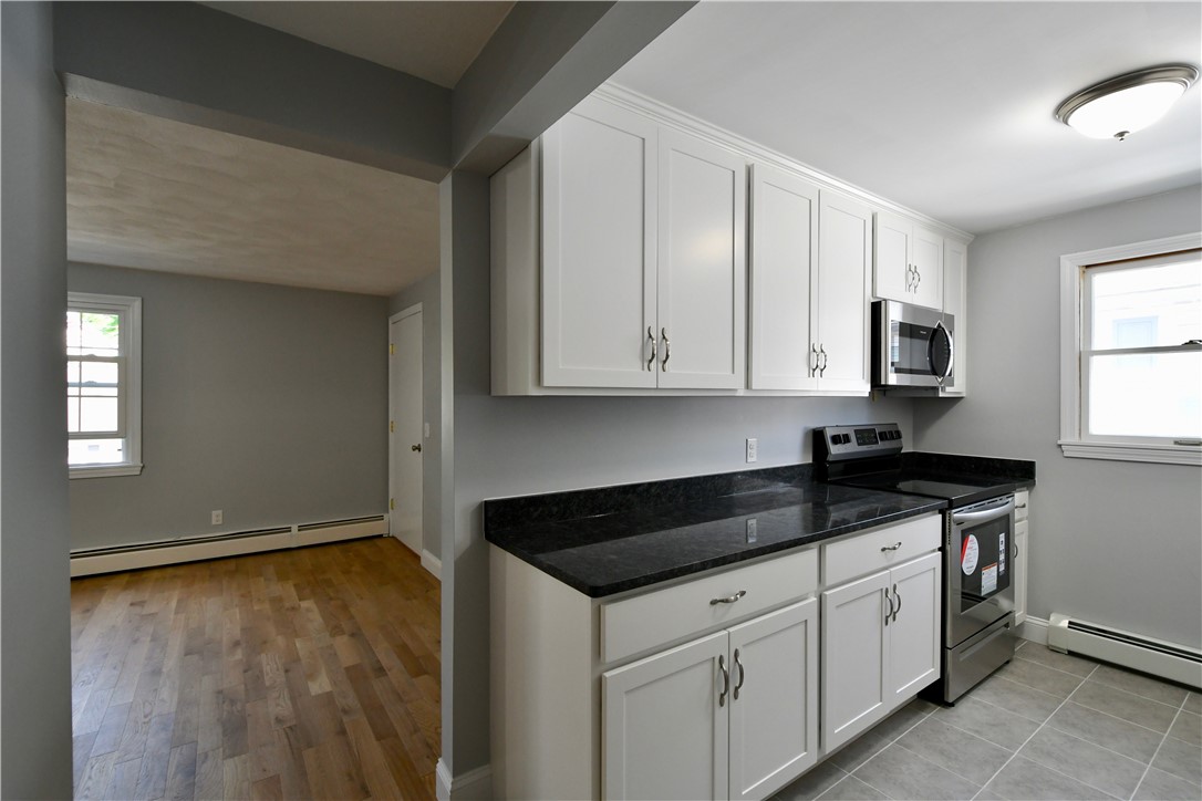70 Sterling Street Pawtucket, RI 02860 - Photo 13 of 14 Open Floor Plan From Dining Room to Kitchen and Living Room.