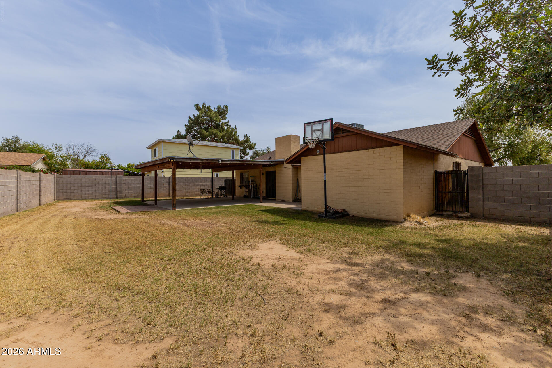 7708 West Flower Street Phoenix, AZ 85033 - Photo 34 of 35 a house view with a garden space