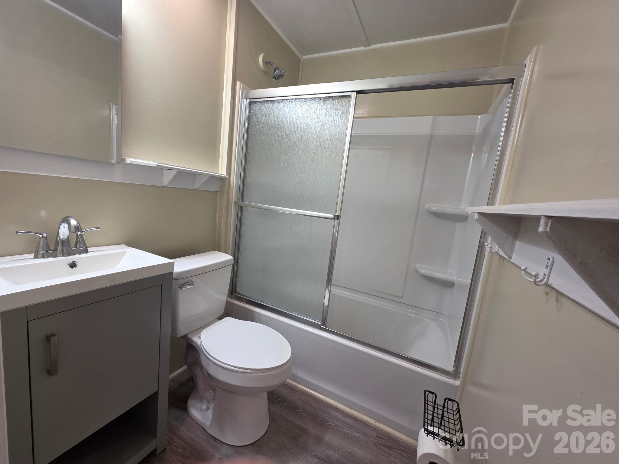 4723 Linden Street Columbia, SC 29203 - Photo 3 of 8 a bathroom with a toilet a sink and shower