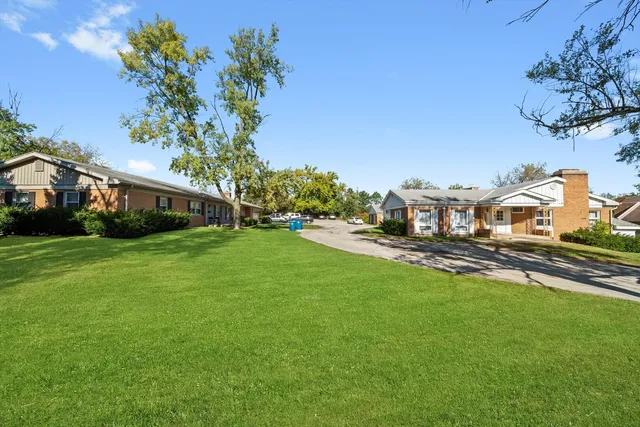 a house view with a garden space