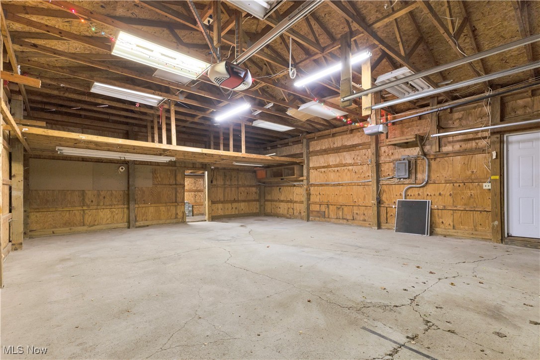 48265 Middle Ridge Road Amherst, OH 44001 - Photo 31 of 43 Inside the 30x24 garage with overhead lighting and garage door openers
