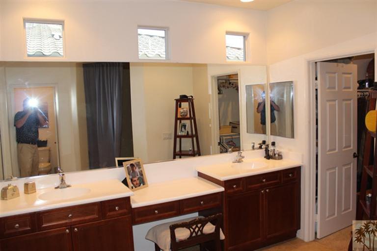 83317 Wagon Road Indio, CA 92203 - Photo 15 of 17 a bathroom with a double vanity sink mirror and double