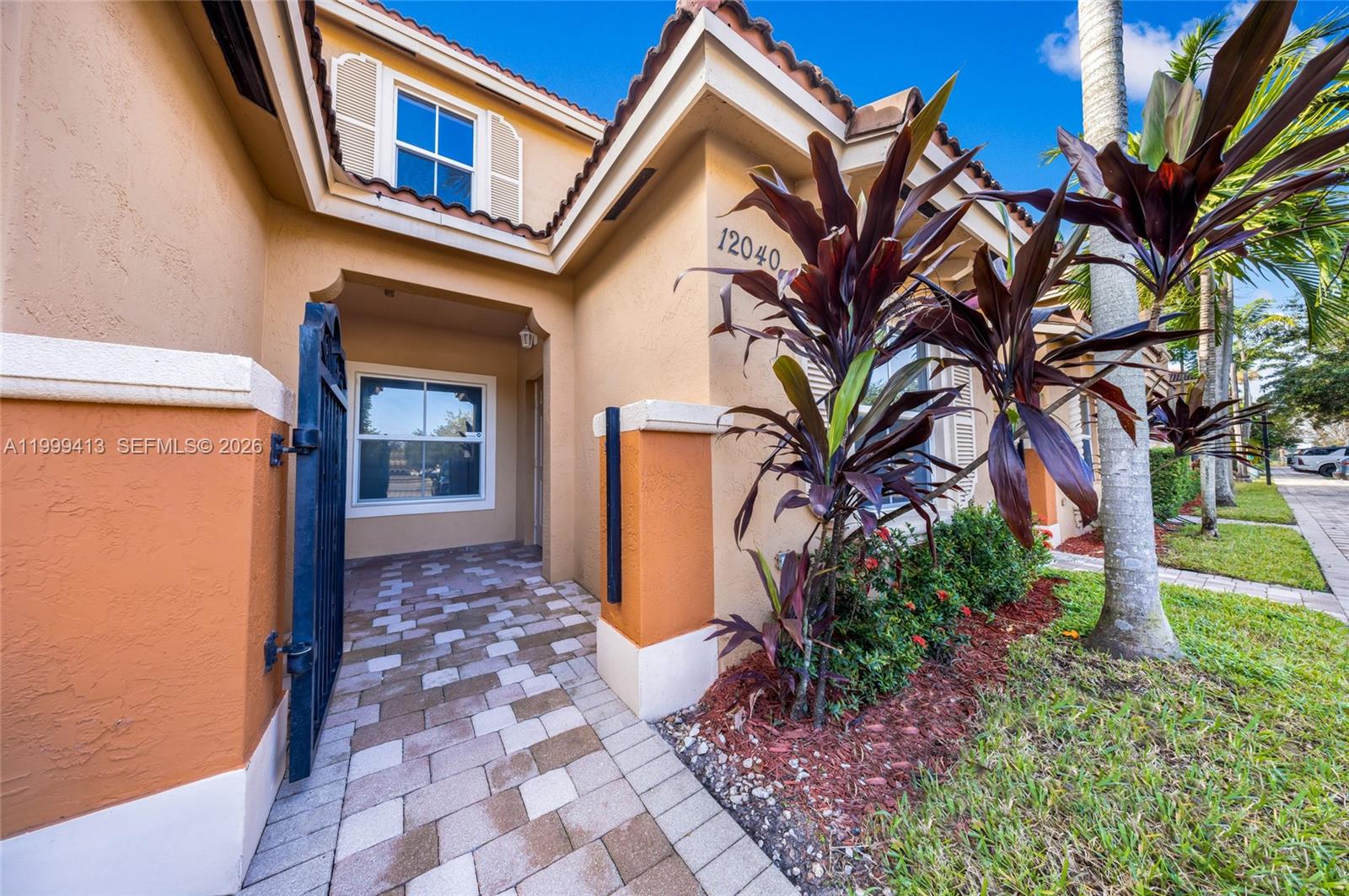 12040 Southwest 28th Street, Unit 4064 Miramar, FL 33025 - Photo 1 of 23 a house with a outdoor space