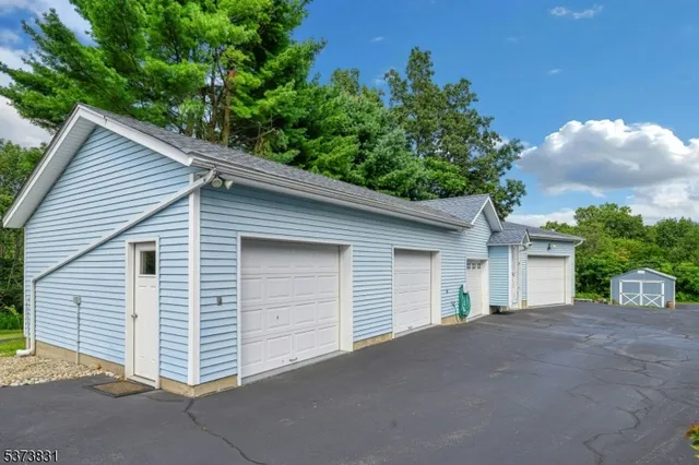a swimming pool with outdoor seating