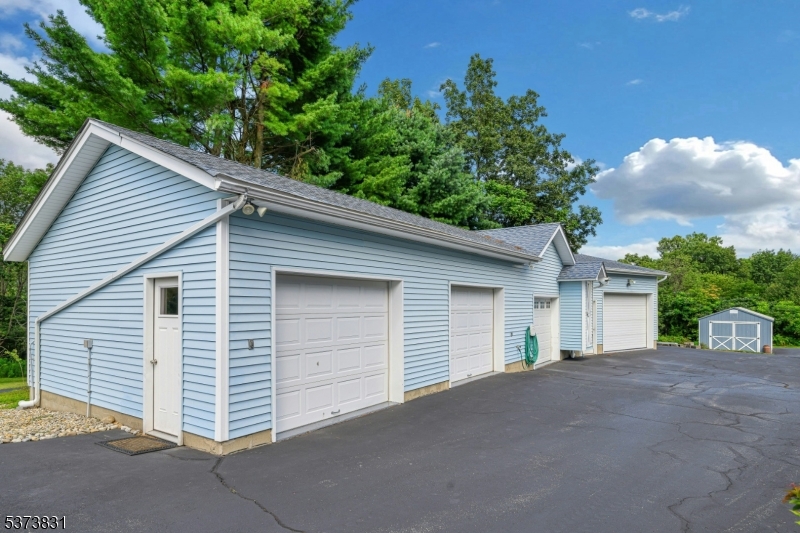 83 Hyatt Road Branchville, NJ 07826 - Photo 6 of 27 a view of a house with a garage