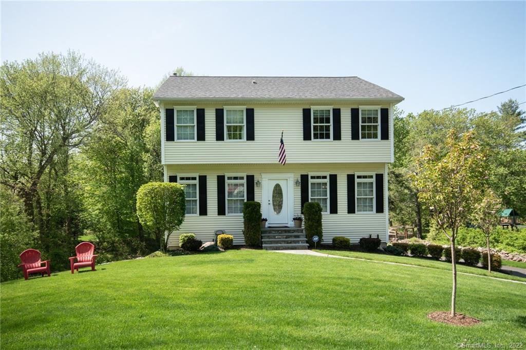 88 Beers Road Easton, CT 06612 - Photo 1 of 1 a front view of a house with a yard