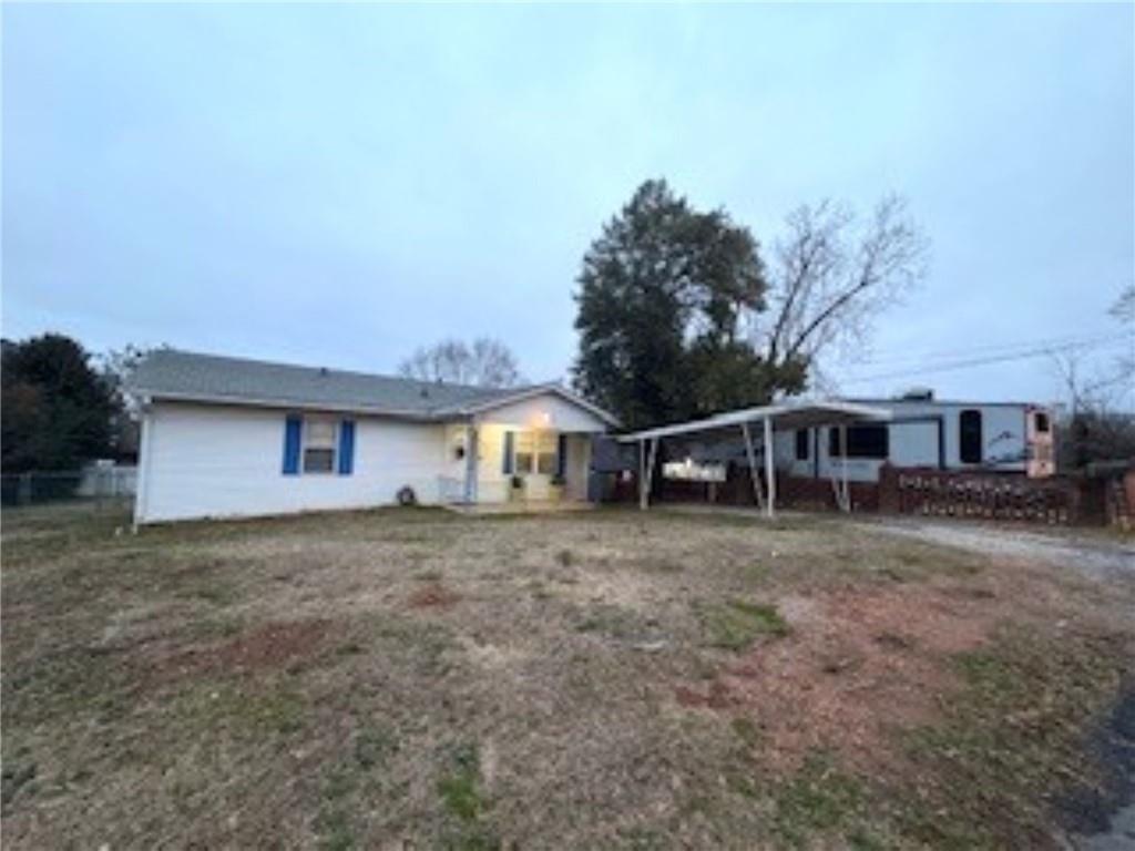 209 Moultrie Lane Southwest Rome, GA 30161 - Photo 4 of 46 a front view of a house with a yard