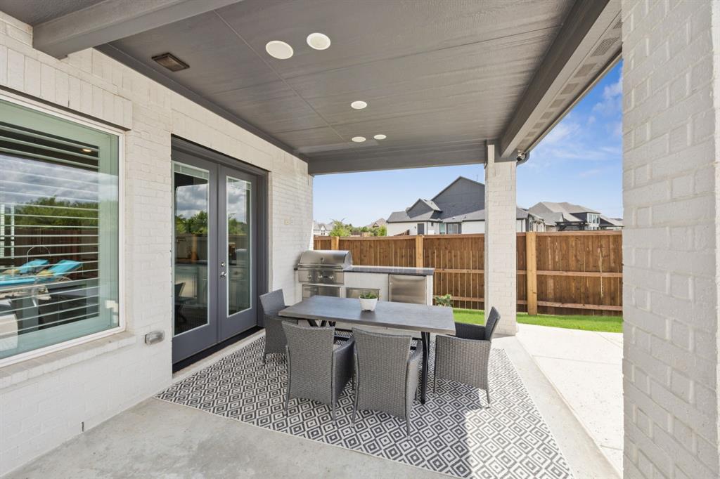 7024 Prairie Ridge Road Argyle, TX 76226 - Photo 32 of 40 Spacious Covered Patio with Outdoor Grill