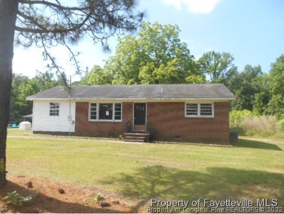 3255 Hayes Mill Road Godwin, NC 28344 - Photo 1 of 11 a view of a house with a big yard