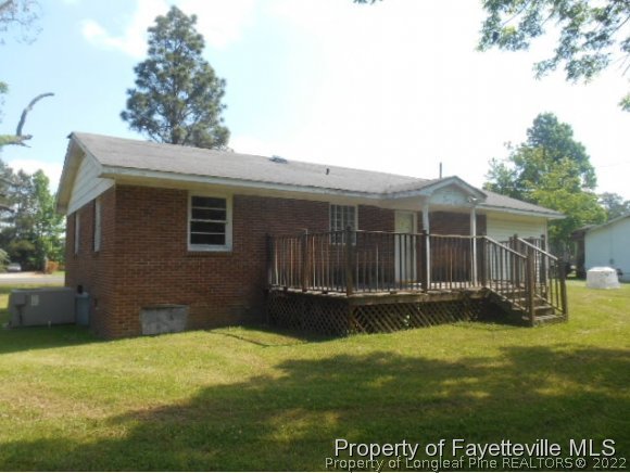 3255 Hayes Mill Road Godwin, NC 28344 - Photo 2 of 11 a view of a house with a yard