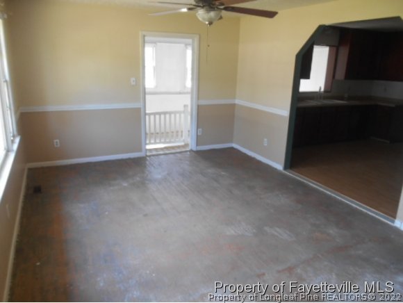 3255 Hayes Mill Road Godwin, NC 28344 - Photo 3 of 11 a view of an empty room with a window