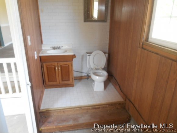 3255 Hayes Mill Road Godwin, NC 28344 - Photo 10 of 11 a bathroom with a toilet and a sink