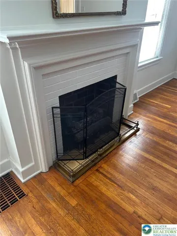 a living room with a fireplace