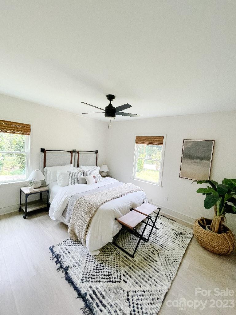 4232 Darwin Circle Charlotte, NC 28209 - Photo 13 of 24 a bedroom with a bed and a window