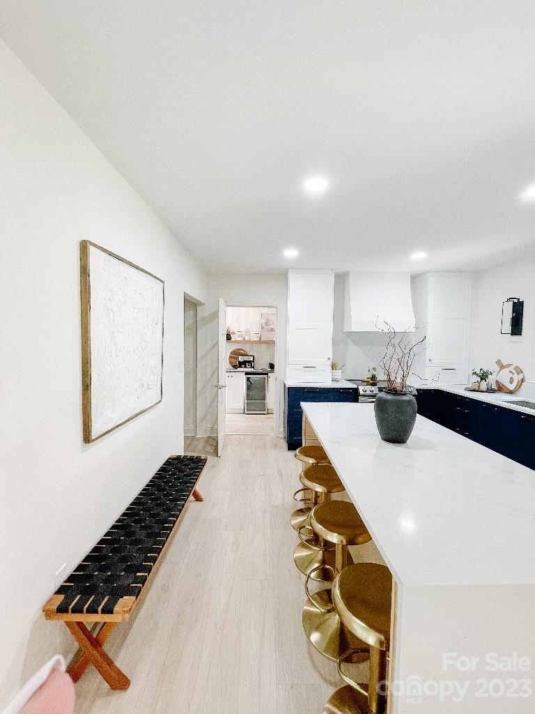 4232 Darwin Circle Charlotte, NC 28209 - Photo 20 of 24 a kitchen with sink and view of living room
