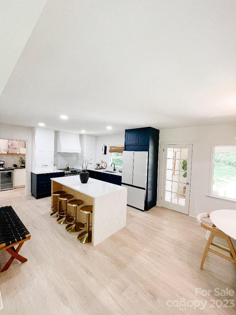 4232 Darwin Circle Charlotte, NC 28209 - Photo 2 of 24 a living room with furniture and a refrigerator