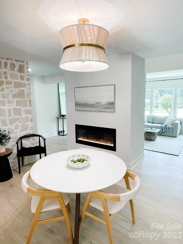 4232 Darwin Circle Charlotte, NC 28209 - Photo 4 of 24 a view of a dining room with furniture