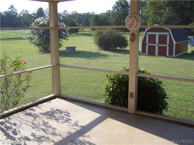 9818 Woodpecker Road Chesterfield, VA 23838 - Photo 2 of 8 a view of a garden from a balcony