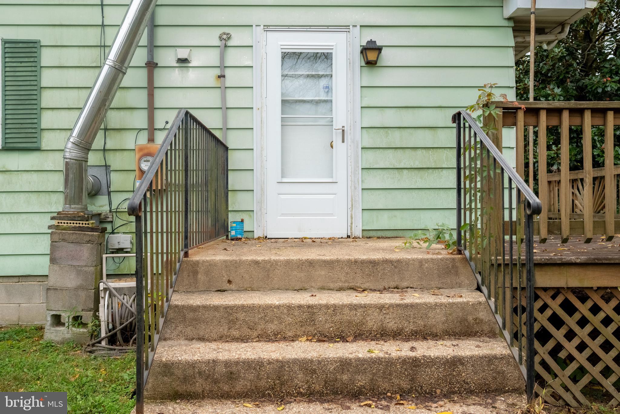 165 Fairground Road Prince Frederick, MD 20678 - Photo 6 of 27 a front view of a house with a garden