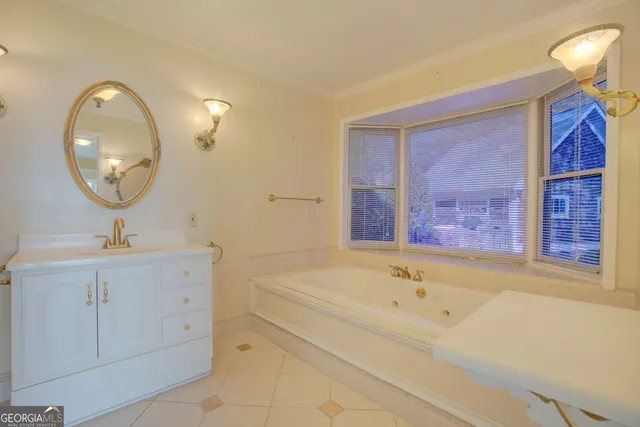 a bathroom with a bathtub and a sink