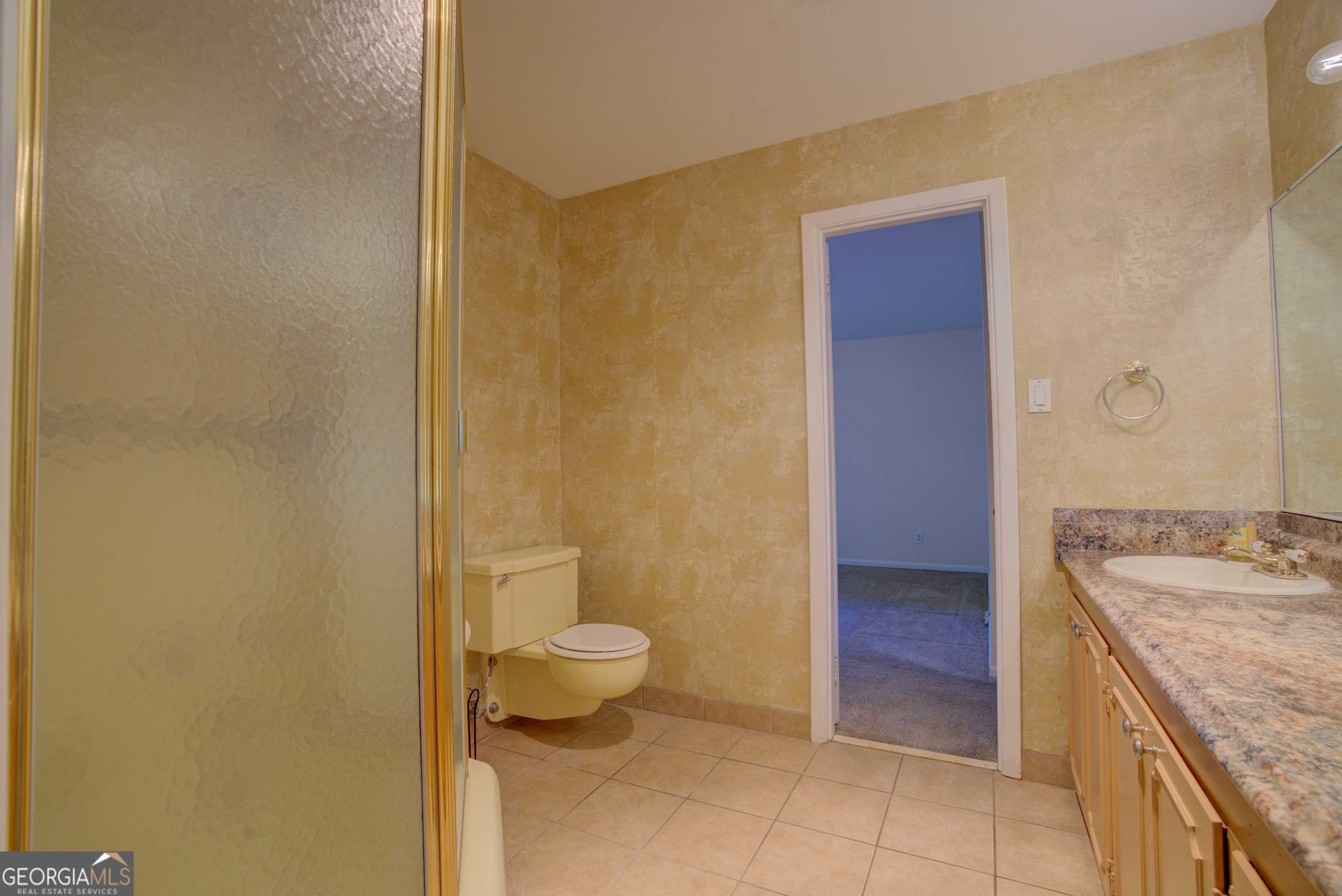 46 Turnbull Drive Rome, GA 30161 - Photo 20 of 47 a bathroom with a granite countertop sink a toilet and a mirror