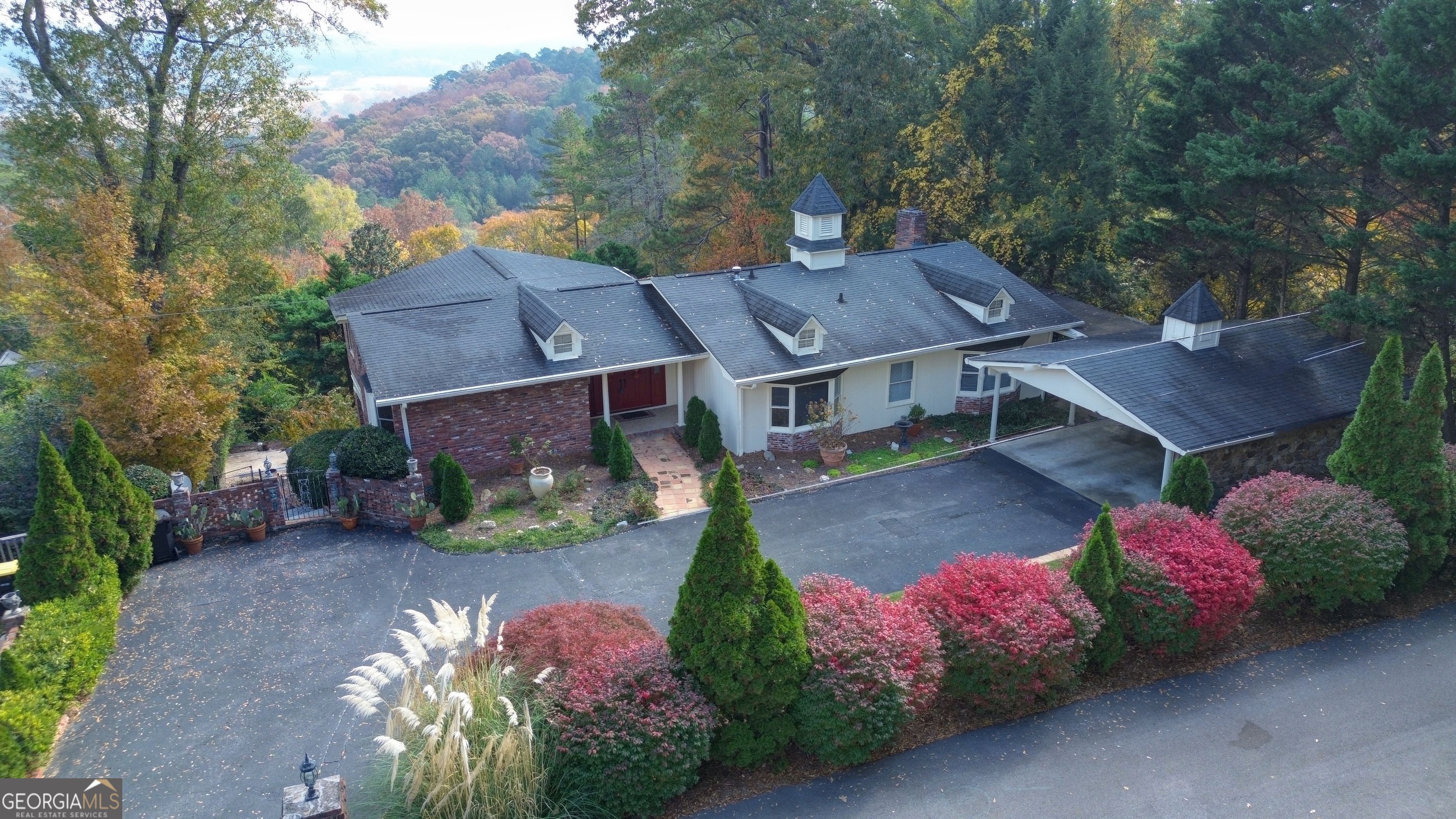 46 Turnbull Drive Rome, GA 30161 - Photo 2 of 47 a aerial view of a house with table and chairs plants
