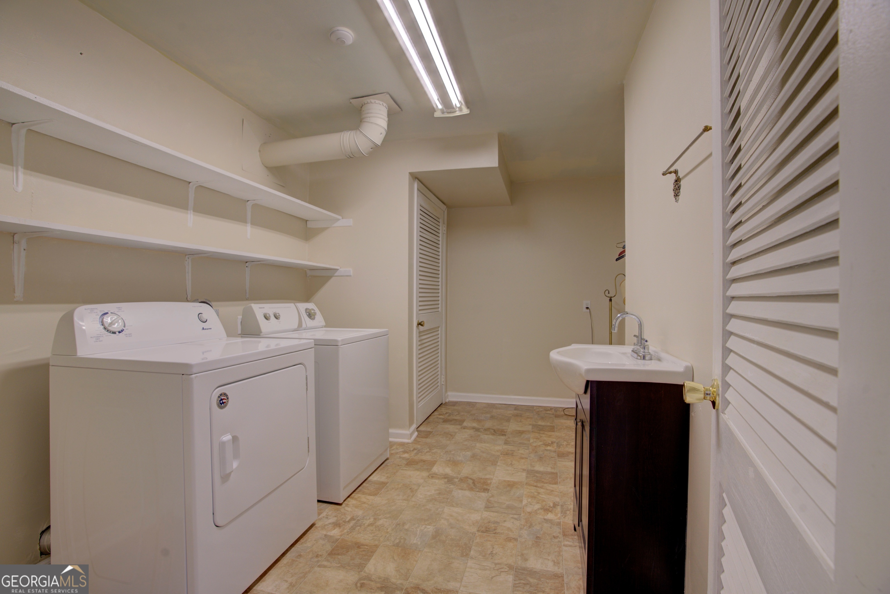 46 Turnbull Drive Rome, GA 30161 - Photo 28 of 47 a utility room with dryer and washer