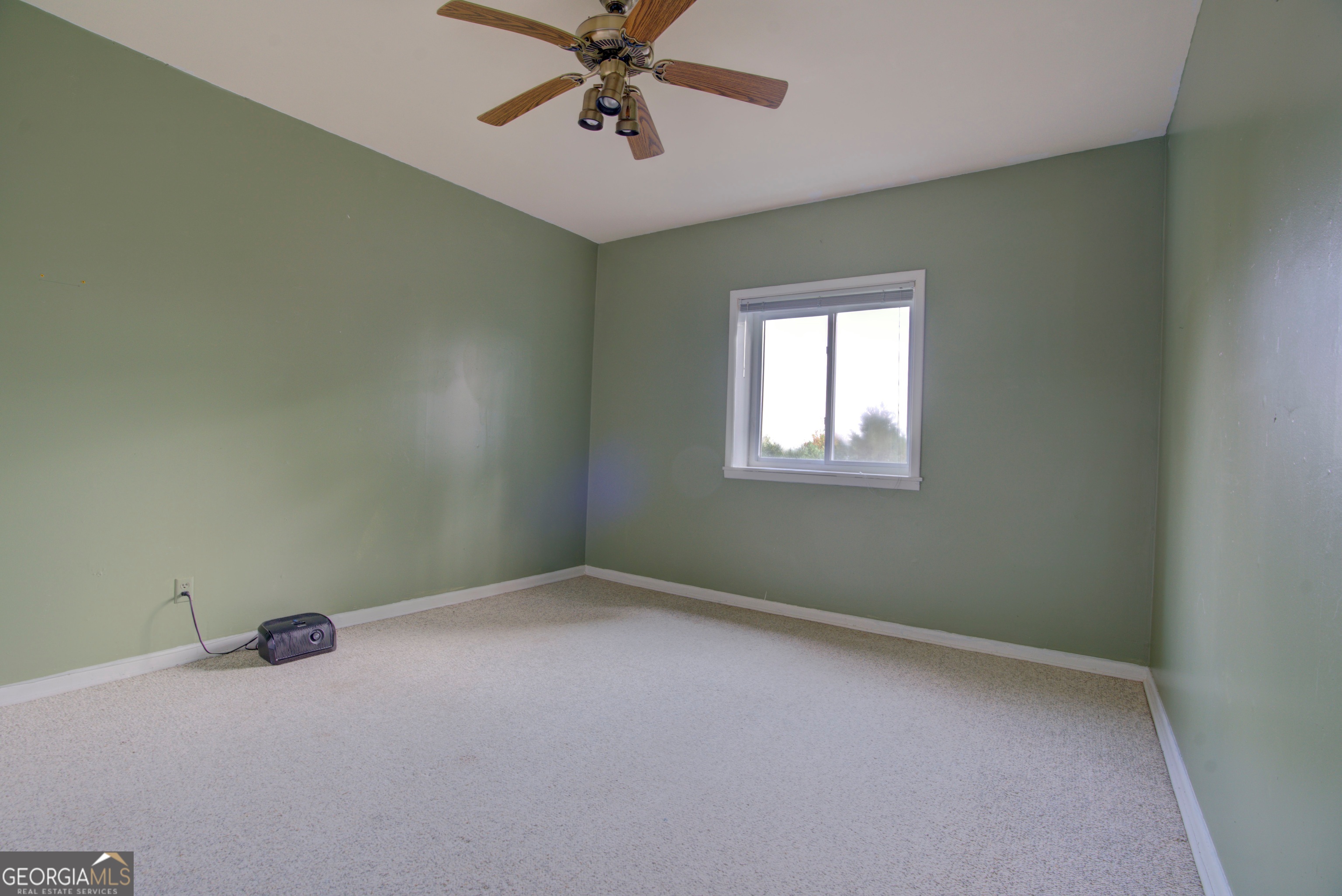 46 Turnbull Drive Rome, GA 30161 - Photo 34 of 47 an empty room with a window and a fan