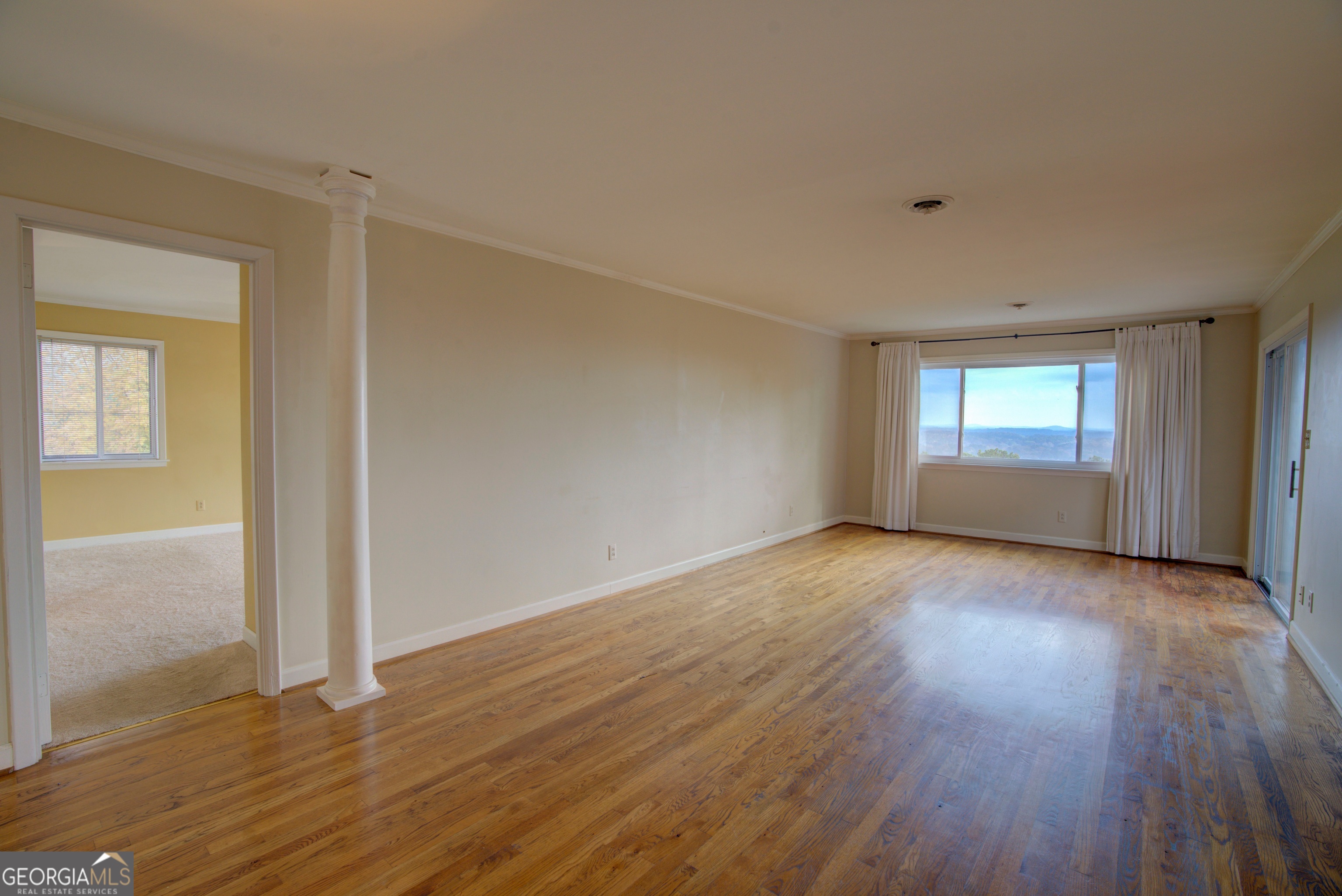 46 Turnbull Drive Rome, GA 30161 - Photo 5 of 47 a view of wooden floor and windows in an empty room