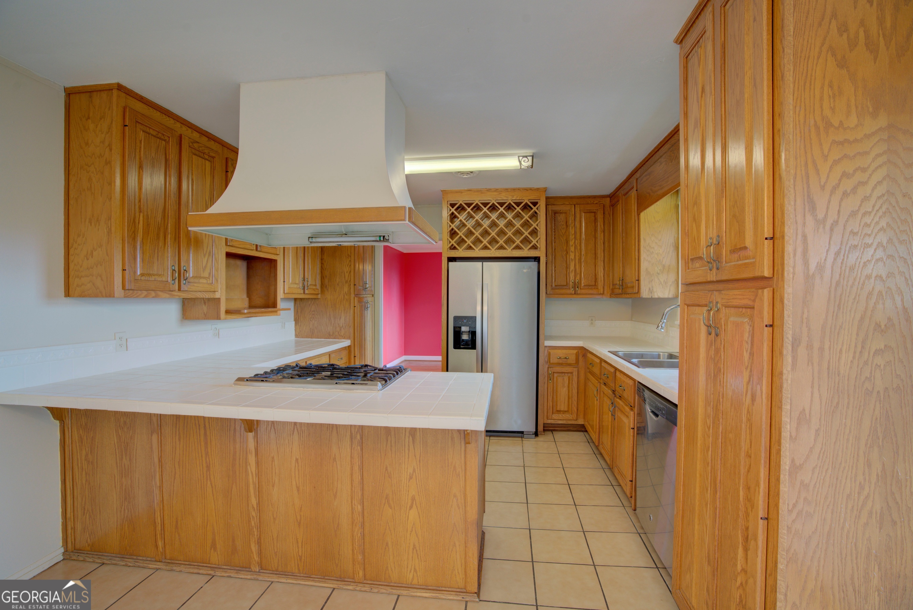 46 Turnbull Drive Rome, GA 30161 - Photo 10 of 47 a kitchen with stainless steel appliances granite countertop a sink and cabinets