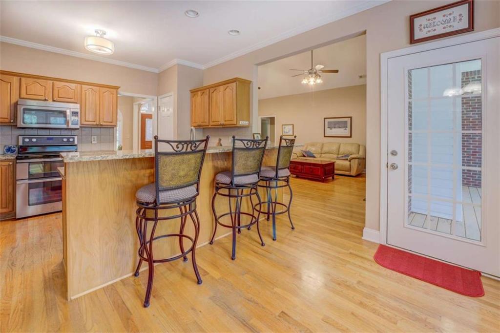 1041 Flat Rock Road Covington, GA 30014 - Photo 12 of 59 a view of a kitchen and dining room