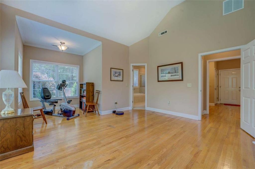 1041 Flat Rock Road Covington, GA 30014 - Photo 19 of 59 a view of a livingroom with furniture and a flat screen tv