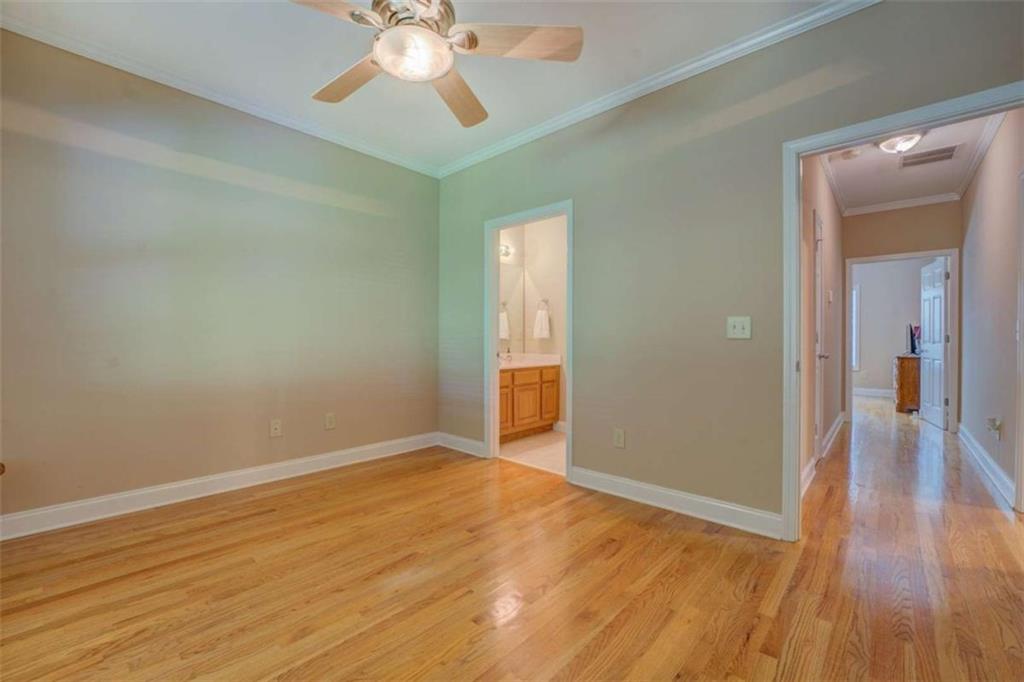 1041 Flat Rock Road Covington, GA 30014 - Photo 28 of 59 a view of an empty room with wooden floor
